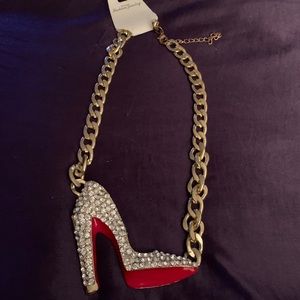 Red bottom shoe necklace with clear rhinestones